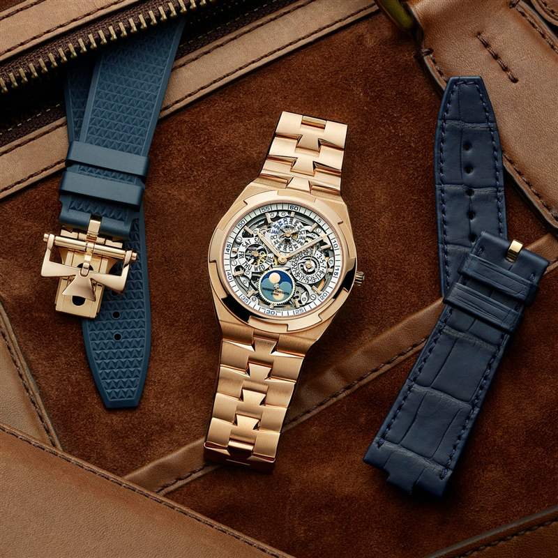 玫瑰金 Vacheron Constantin 手表，皮革背景，旁邊有兩條表帶